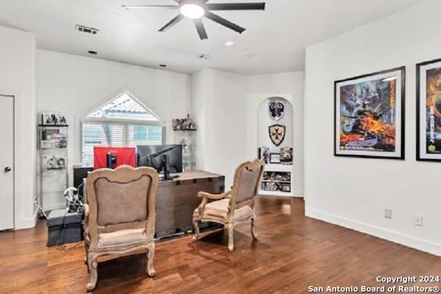 home office with hardwood / wood-style flooring and ceiling fan