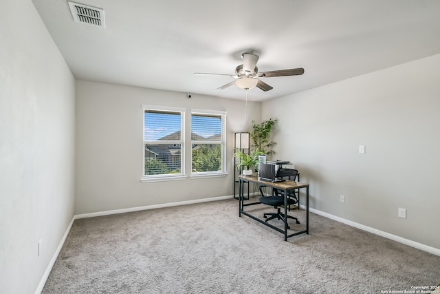 home office featuring carpet flooring and ceiling fan