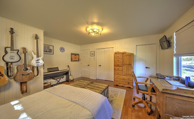 bedroom with hardwood / wood-style floors