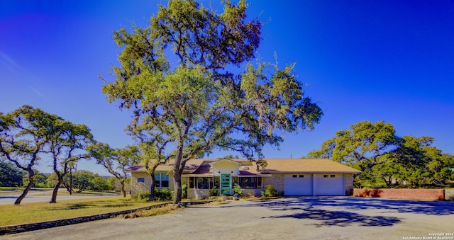 view of front of property with a garage