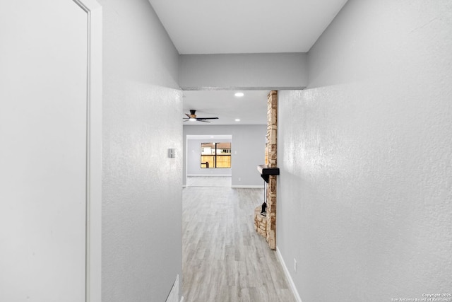 hallway featuring light hardwood / wood-style floors