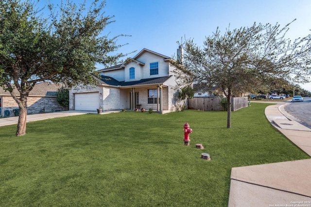 front facade with a front lawn and a garage