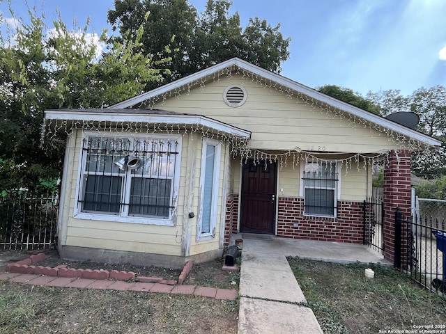 bungalow-style home with covered porch