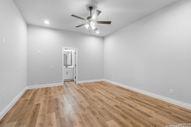 unfurnished room with light wood-type flooring and ceiling fan