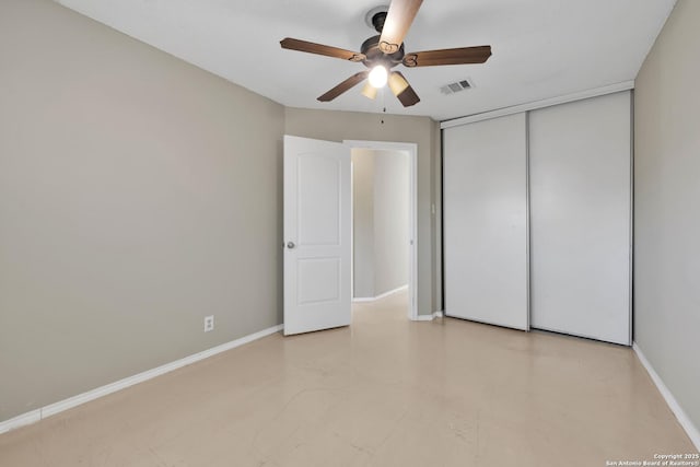 unfurnished bedroom with a closet and ceiling fan