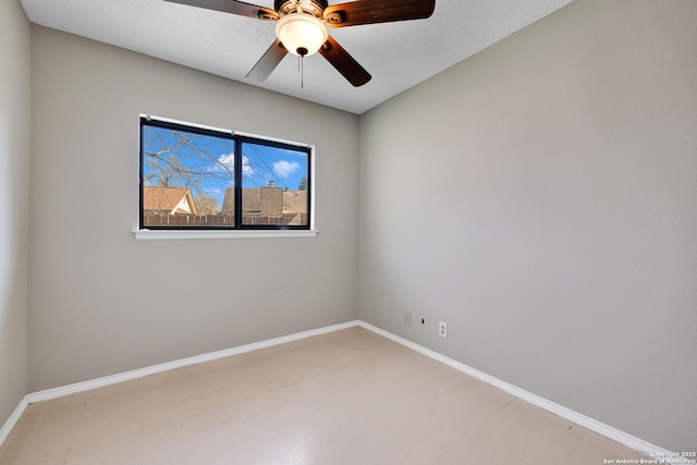 spare room featuring ceiling fan