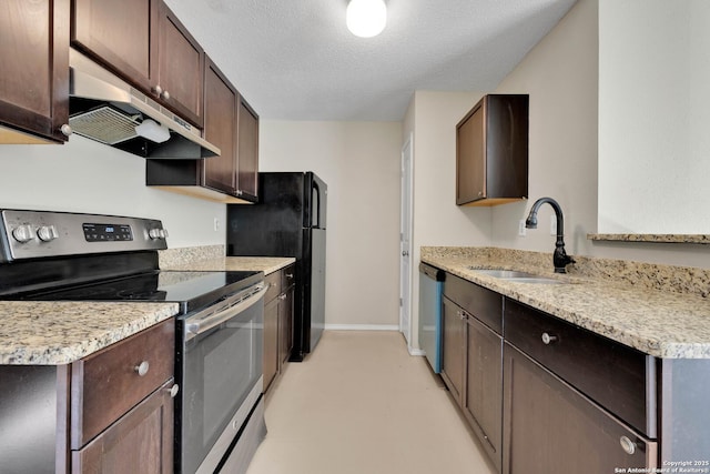 kitchen with a textured ceiling, dark brown cabinetry, sink, and appliances with stainless steel finishes