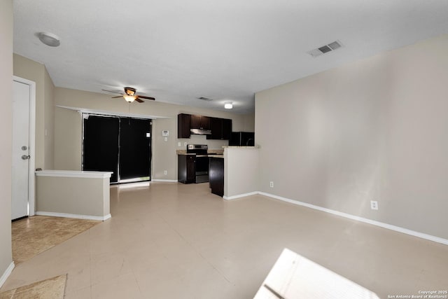 unfurnished living room with light tile patterned floors and ceiling fan