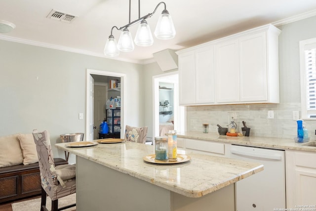 kitchen with white cabinetry, a center island, hanging light fixtures, a kitchen breakfast bar, and white dishwasher