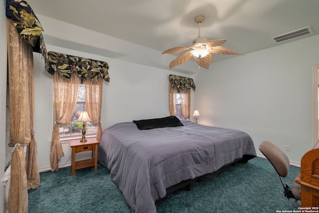 carpeted bedroom with ceiling fan