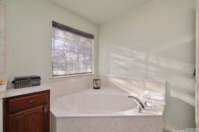 bathroom featuring tiled bath