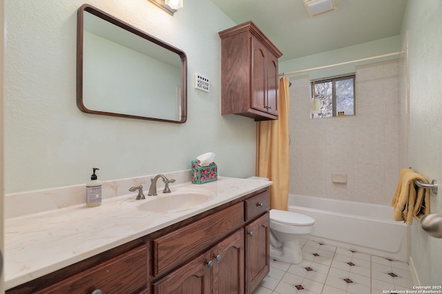 full bathroom with vanity, shower / bath combination with curtain, and toilet