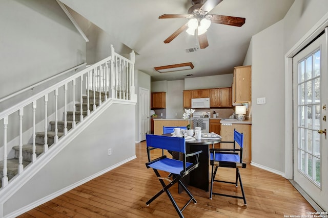 dining space featuring light hardwood / wood-style flooring