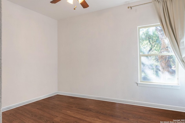 spare room with ceiling fan and hardwood / wood-style floors