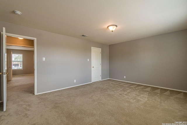 view of carpeted spare room