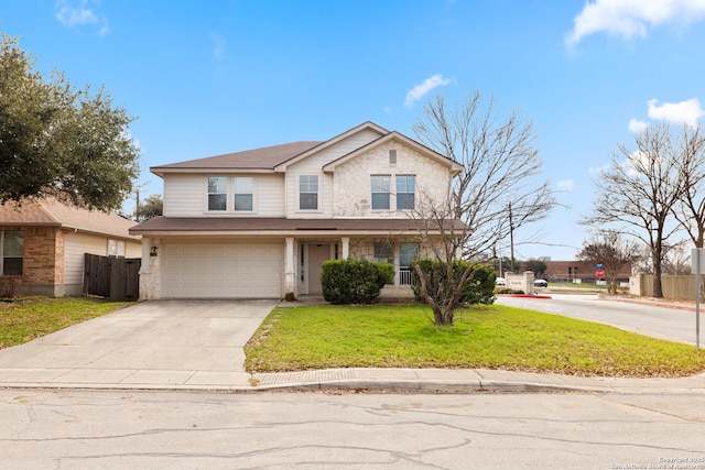 view of front property with a front yard and a garage