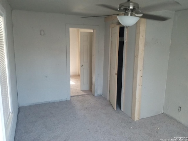 interior space featuring ceiling fan