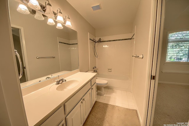 full bathroom featuring toilet, vanity, tile patterned floors, and tub / shower combination