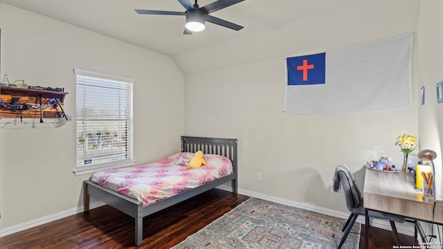 bedroom featuring hardwood / wood-style flooring, vaulted ceiling, and ceiling fan