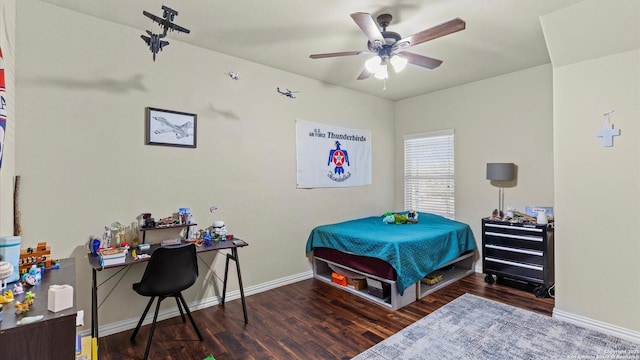 bedroom featuring ceiling fan and dark hardwood / wood-style floors