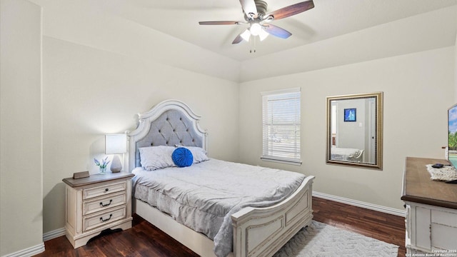 bedroom with ceiling fan and dark wood-type flooring