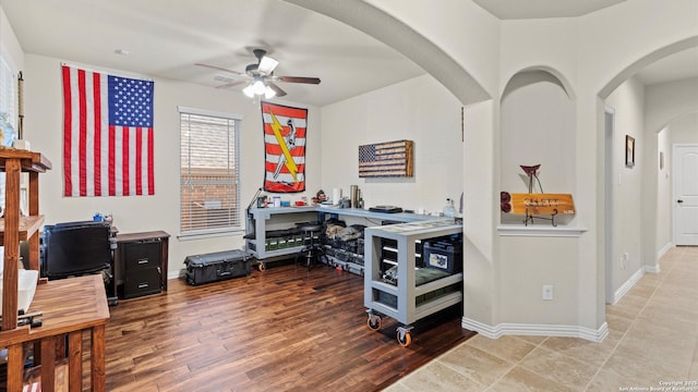 home office with ceiling fan and wood-type flooring