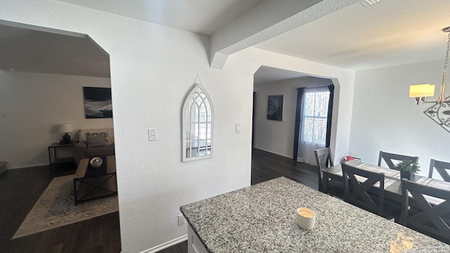 dining space with a chandelier