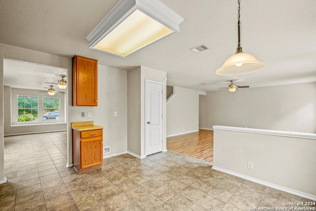 kitchen featuring hanging light fixtures