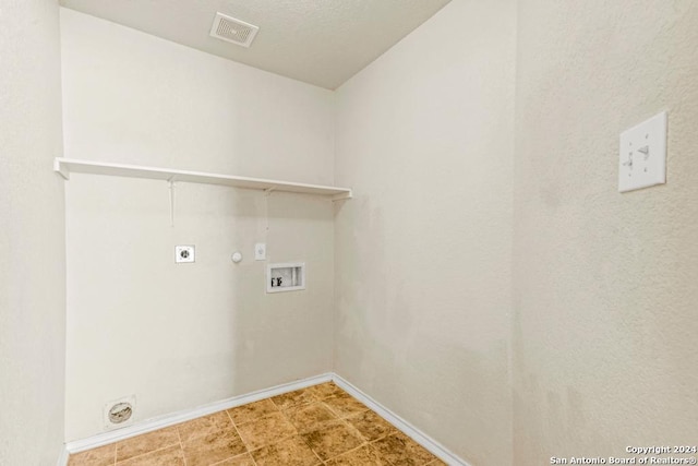 washroom featuring gas dryer hookup, washer hookup, and hookup for an electric dryer