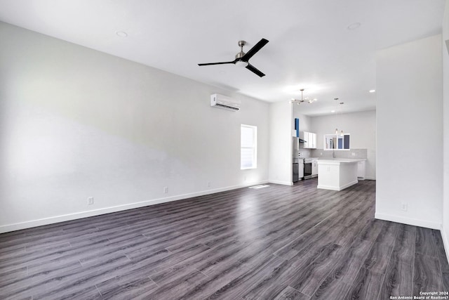 unfurnished living room featuring dark hardwood / wood-style flooring, an AC wall unit, and ceiling fan