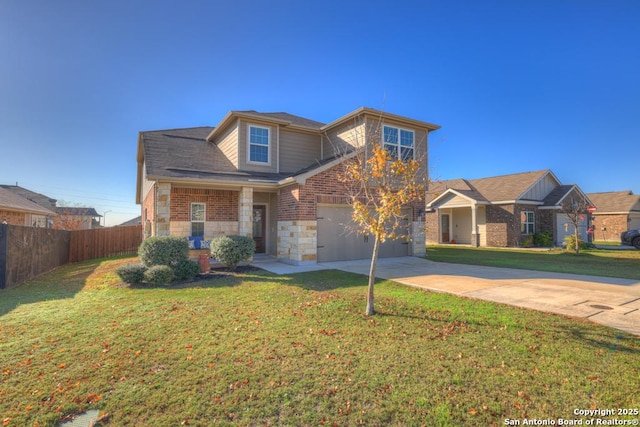 view of front facade featuring a front yard and a garage