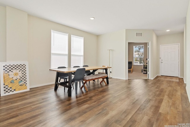 dining area featuring wood-type flooring