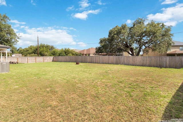 view of yard featuring central AC