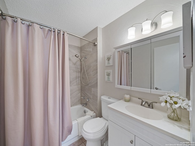 full bathroom featuring shower / bath combo with shower curtain, vanity, a textured ceiling, and toilet