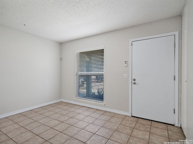 interior space featuring a textured ceiling