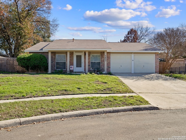 single story home featuring a front yard and a garage