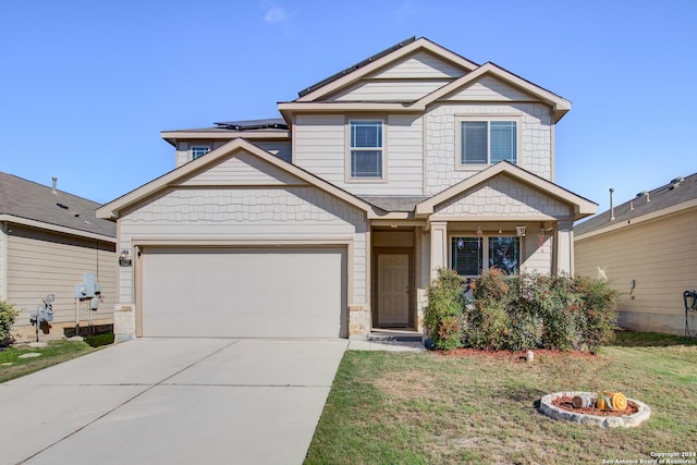 craftsman-style house featuring a front yard