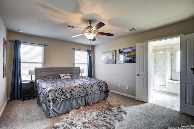 bedroom featuring carpet flooring, ceiling fan, and a textured ceiling