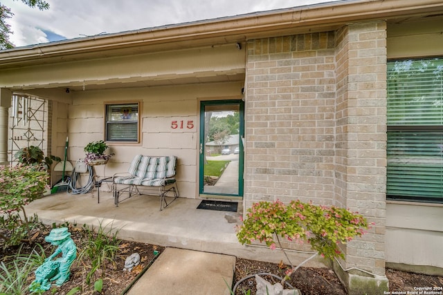 entrance to property with a porch