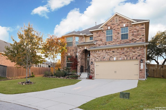 view of front of home with a front yard and a garage