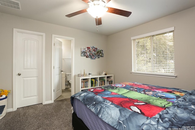 bedroom featuring ensuite bathroom, ceiling fan, and carpet floors