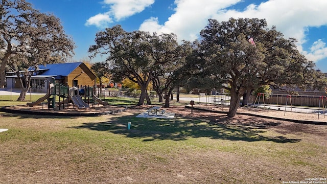 view of jungle gym with a yard