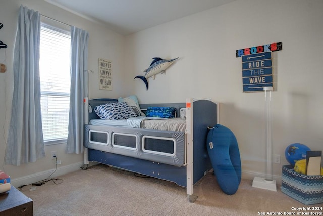 bedroom featuring carpet flooring