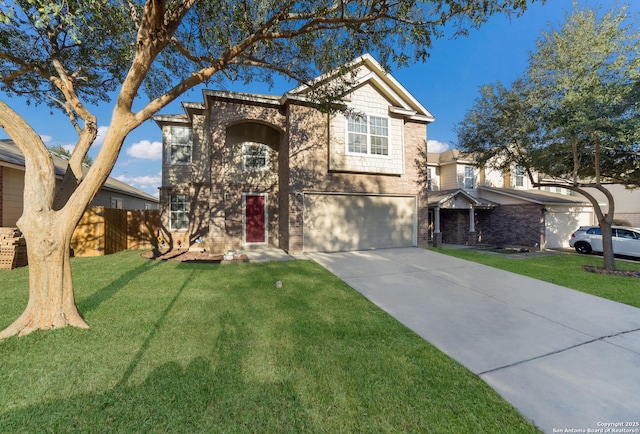 view of front of property featuring a front yard and a garage