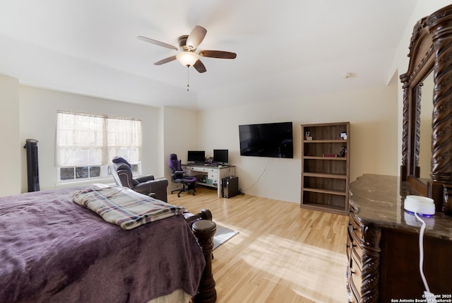 bedroom featuring ceiling fan and light hardwood / wood-style flooring