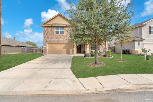 view of front of house featuring a front lawn and a garage