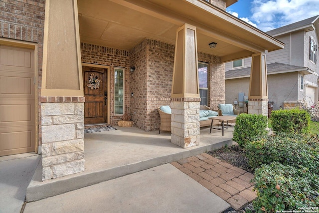 property entrance featuring covered porch