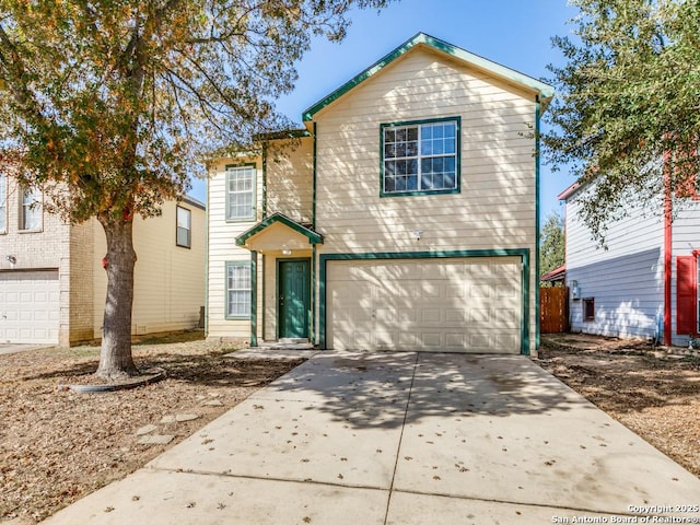 front of property with a garage