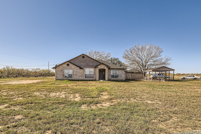 ranch-style home with a front lawn