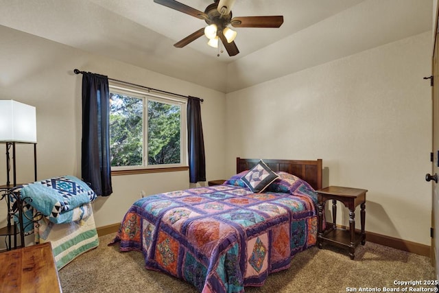 bedroom featuring carpet, ceiling fan, and lofted ceiling